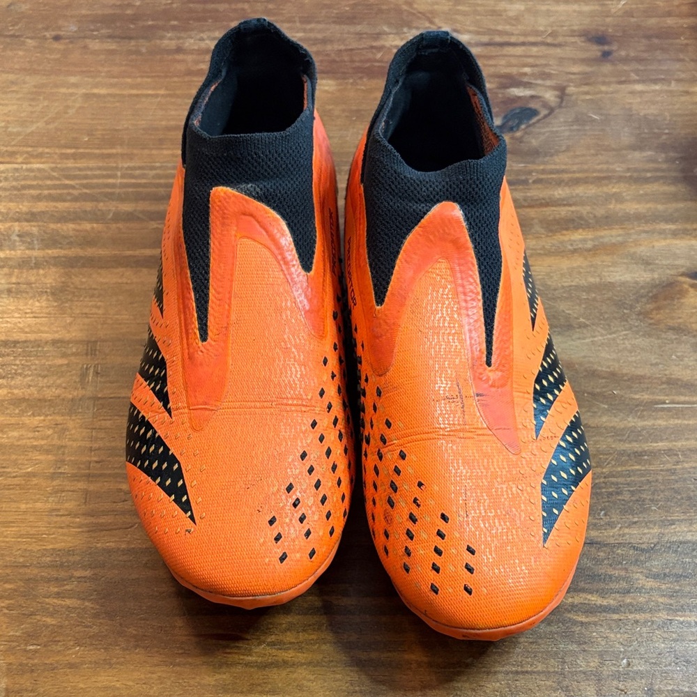 Orange and Black Soccer Cleats
